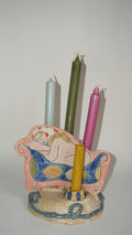 Dreaming Figure Candleholder